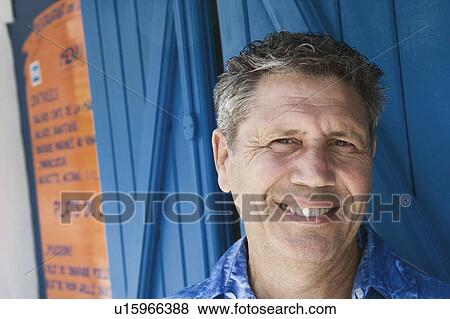 Stock Photo - Portrait of a senior man smiling. Fotosearch