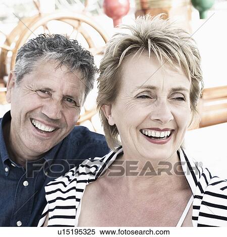 Stock Photography - Close-up of a senior man and a mature woman smiling. Fotosearch