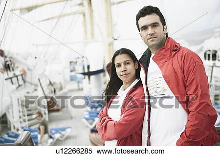 Stock Photography - Portrait of a young couple on a passenger craft. Fotosearch