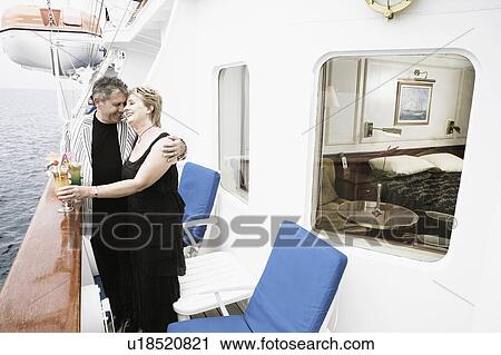 Senior man and a mature woman romancing on a sailing ship View Large Photo Image Stock Image - Senior man and a mature woman romancing on a sailing ship. Fotosearch