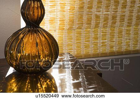 Stock Photo - Brown glass lamp base. Fotosearch