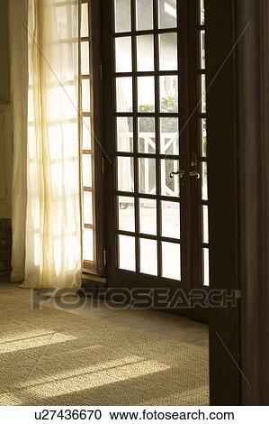 Closed French Doors And Sheer Drapery Stock Image U27436670