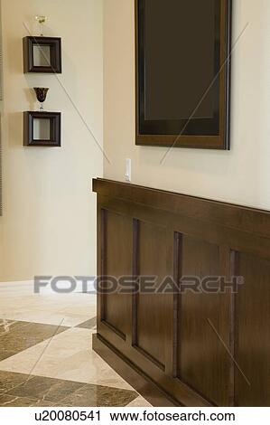 Stock Image - Dark wainscot in hallway. Fotosearch