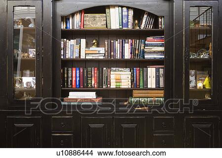 Picture - Dark wood bookshelf. Fotosearch