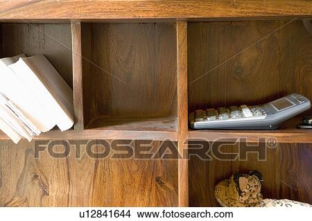 Picture - Detail of built in shelves on a desk. Fotosearch