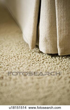 Picture - Detail of carpet and upholstery corner.. Fotosearch