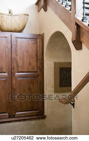 Detail of hallway beneath staircase View Large Photo Image Stock Image - Detail of hallway beneath staircase. Fotosearch