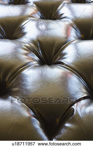 Stock Photo - Leather cushion with buttons. Fotosearch