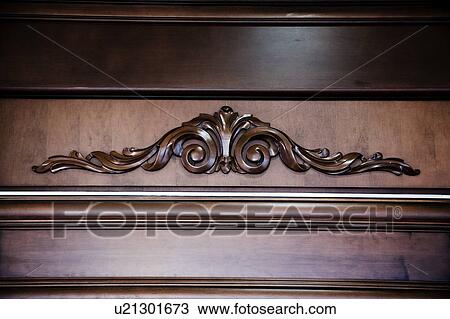 Ornate detail on wood armoire View Large Photo Image Stock Image - Ornate detail on wood armoire. Fotosearch