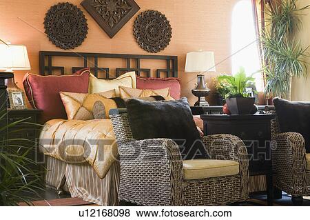 Stock Photo - Armchairs in bedroom. Fotosearch
