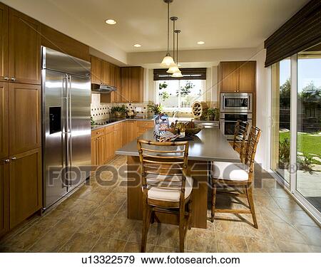 Contemporary kitchen with large island View Large Photo Image Stock Photo - Contemporary kitchen with large island. Fotosearch