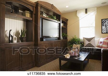 Stock Photography - Living room with large entertainment center. Fotosearch