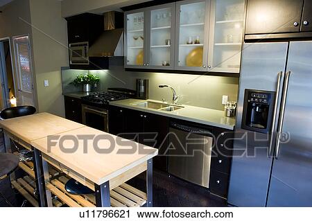 Stock Image - Modern kitchen area. Fotosearch