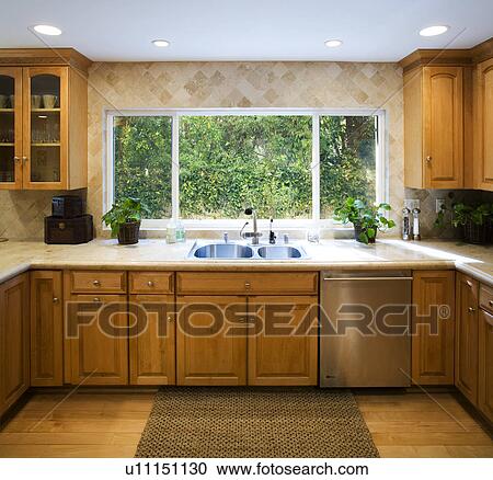 Stock Image - Traditional kitchen with hardwood floors. Fotosearch
