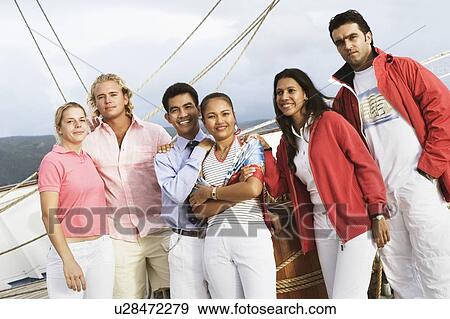Stock Photo - Portrait of three young couples posing. Fotosearch