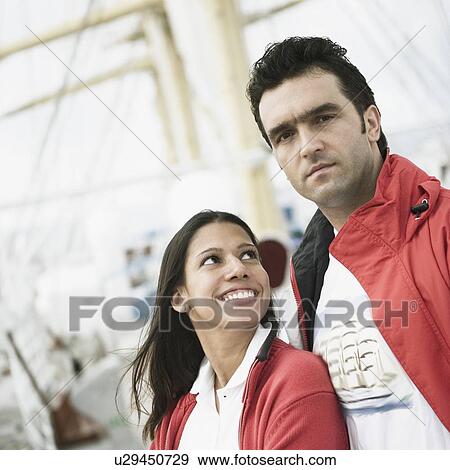 Stock Photo - Young couple on a passenger craft. Fotosearch