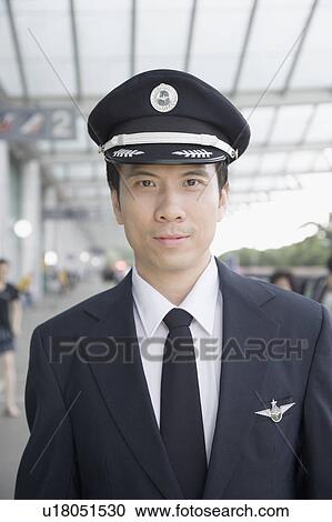 Portrait of a male pilot View Large Photo Image Stock Image - Portrait of a male pilot. Fotosearch