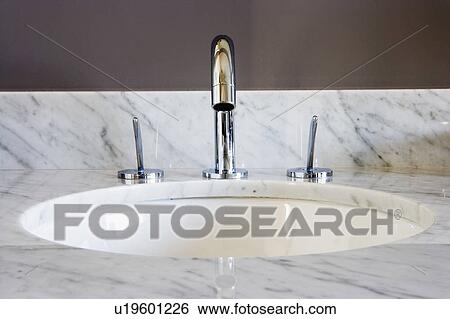 Stock Photograph - Bathroom Sink and Faucet. Fotosearch