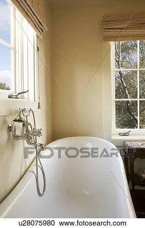 Claw Foot Bathtub and Chrome Faucet View Large Photo Image Stock Image - Claw Foot Bathtub and Chrome Faucet. Fotosearch