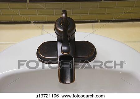 Contemporary Faucet with Green Tile Backsplash View Large Photo Image Stock Photograph - Contemporary Faucet with Green Tile Backsplash. Fotosearch