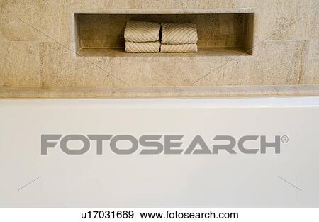 Stock Photo - Detail of bathtub and towels. Fotosearch