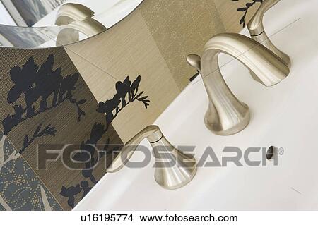 Detail of faucet on bathroom sink View Large Photo Image Picture - Detail of faucet on bathroom sink. Fotosearch