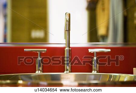 Picture - Golden faucet. Fotosearch