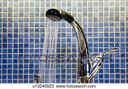 Kitchen faucet and blue tiled backsplash View Large Photo Image Stock Image - Kitchen faucet and blue tiled backsplash. Fotosearch
