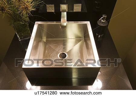 Stock Image - Modern square metal sink. Fotosearch