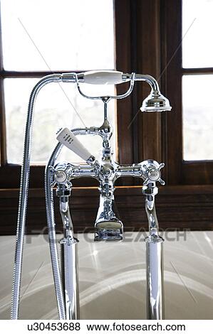 Vintage faucet and bathtub View Large Photo Image Stock Photo - Vintage faucet and bathtub. Fotosearch