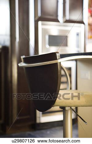 Stock Photograph - Detail of modern barstool. Fotosearch
