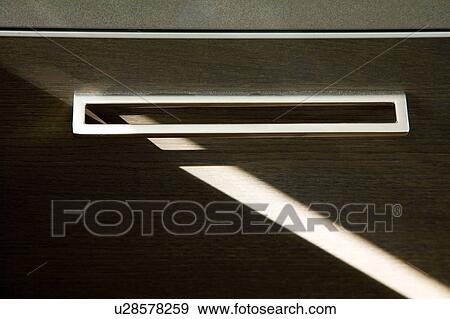 Detail of modern drawer handle View Large Photo Image Stock Photo - Detail of modern drawer handle. Fotosearch