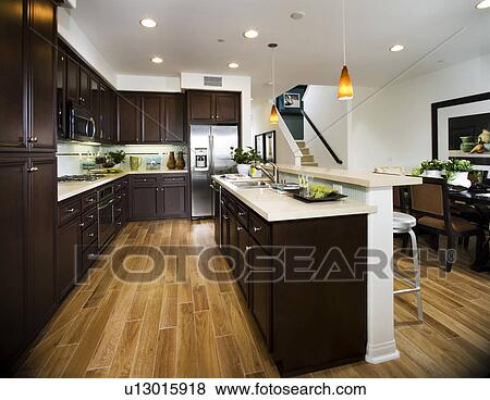 Interior of contemporary kitchen with bar View Large Photo Image Stock Photo - Interior of contemporary kitchen with bar. Fotosearch