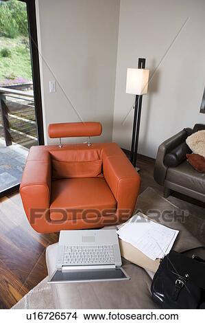 Laptop And Modern Orange Leather Armchair Picture U16726574 Fotosearch