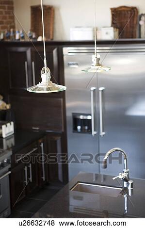 Lights over modern kitchen View Large Photo Image Stock Photo - Lights over modern kitchen. Fotosearch