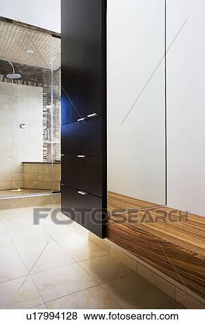 Stock Photo - Modern cabinet and wood bench. Fotosearch
