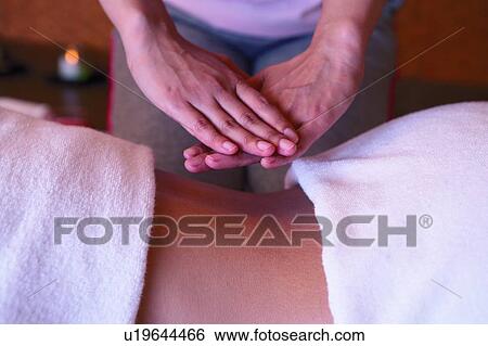 Person receiving back massage, side view, close-up View Large Photo Image Stock Photograph - Person receiving back massage, side view, close-up. Fotosearch