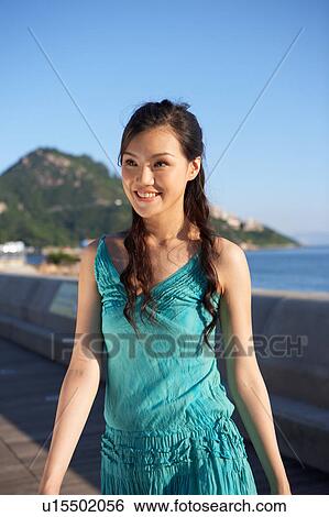 Young Lady Walking along Promenade View Large Photo Image Stock Photograph - Young Lady Walking along Promenade. Fotosearch
