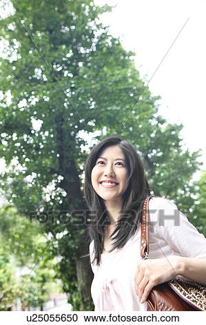 Stock Image - Verdure and woman. Fotosearch
