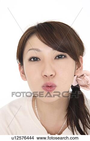 Woman pouting View Large Photo Image Picture - Woman pouting. Fotosearch