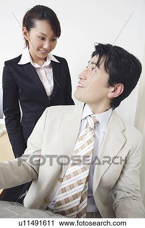 Stock Image - Boss and subordinate. Fotosearch