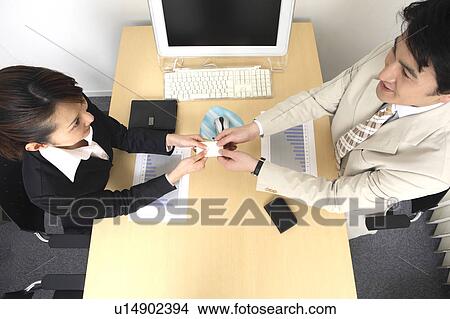 Business card exchange View Large Photo Image Picture - Business card exchange. Fotosearch