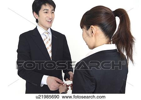 Stock Image - Business card exchange. Fotosearch