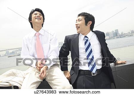 Businessman taking the break during going out View Large Photo Image Stock Image - Businessman taking the break during going out. Fotosearch