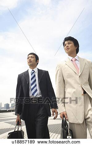 Businessmen and blue sky View Large Photo Image Stock Photo - Businessmen and blue sky. Fotosearch