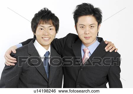 Stock Photograph - Businessmen grappling each shoulder. Fotosearch