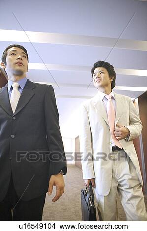 Picture - Businessmen moving. Fotosearch