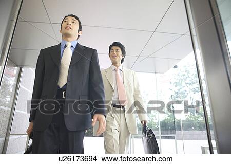 Businessmen moving View Large Photo Image Picture - Businessmen moving. Fotosearch