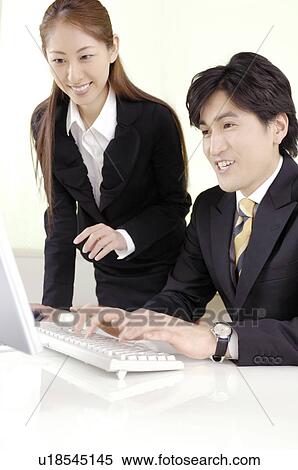Office workers who do a meeting View Large Photo Image Stock Photography - Office workers who do a meeting. Fotosearch