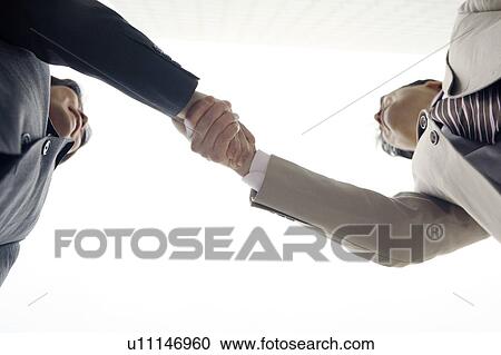 Stock Image - Shaking hands. Fotosearch